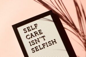 A sign that says self-care isn't selfish. 