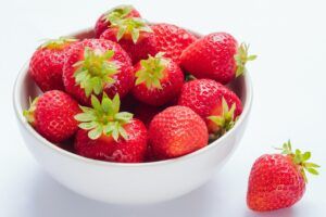 A bowl of strawberries. 