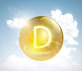 A yellow spherical shape with vitamin D written within it surrounded by the blue sky with clouds.