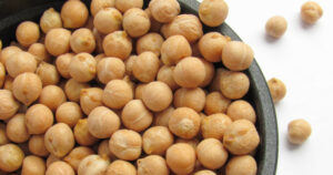 A close up of a bowl of chickpeas.