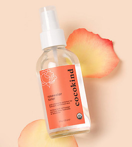 Cocokind rosewater toner with rose petals. 