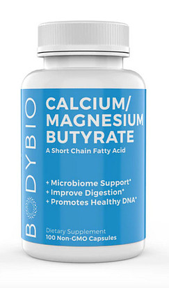 A bottle of Body Bio Calcium Magnesium Butyrate supplement.