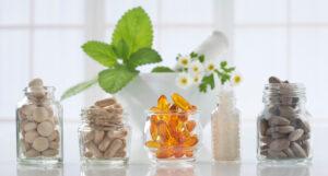 Natural supplements with a mortar and pestle. 